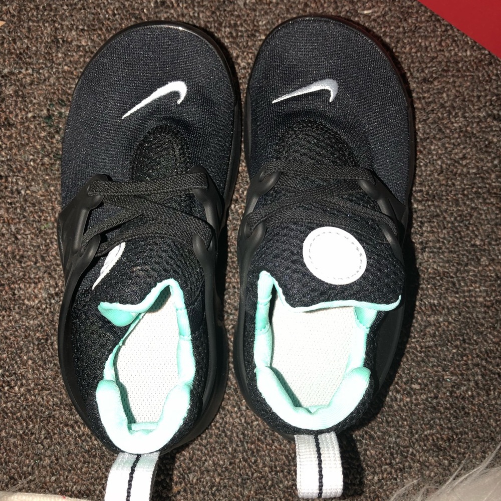 Black and teal Nike prestos new